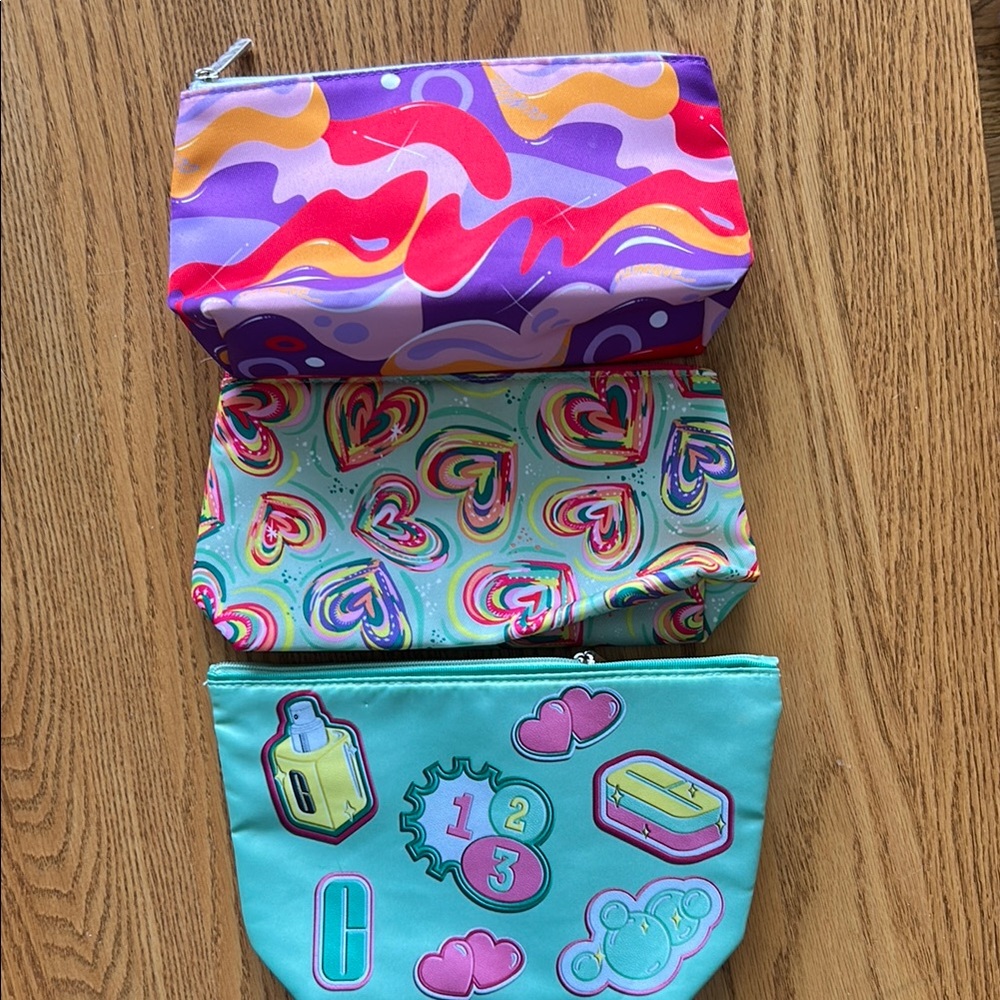 Clinique Purple and Pink Cosmetic Bags Set